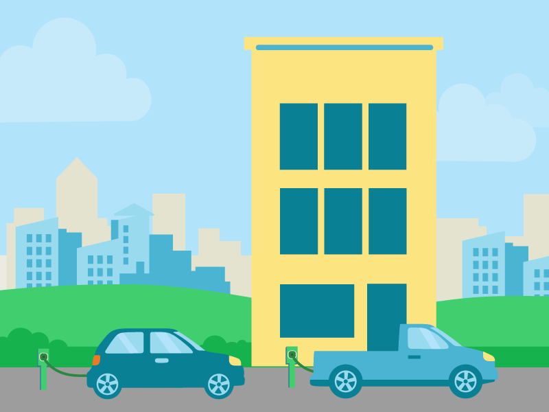 Illustration of an electric car and pickup truck charging at curbside stations outside an apartment building, with a city skyline in the background